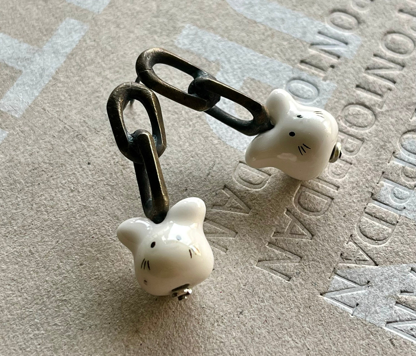 aros cadena vintage y porcelana.